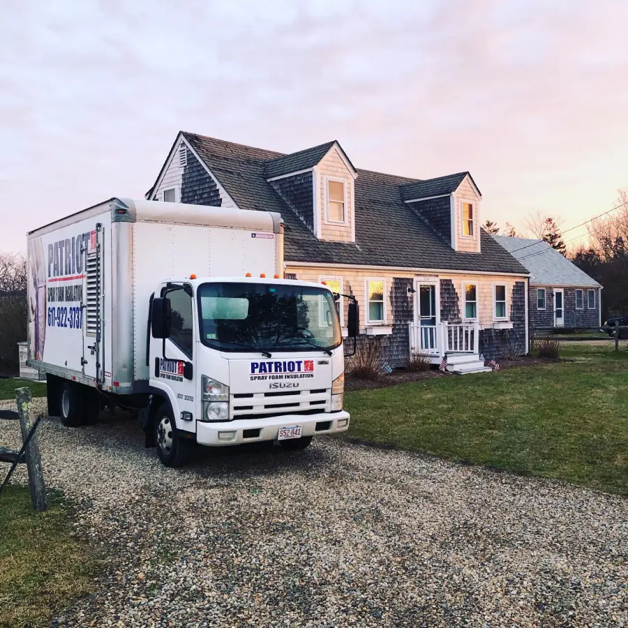 Patriot Spray Foam Insulation truck parked at a Massachusetts home